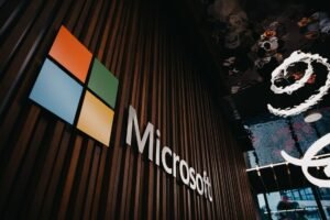 Microsoft Outlook Certificate Level 1 - Interior view of Microsoft office with logo on wooden wall in Brussels, Belgium.