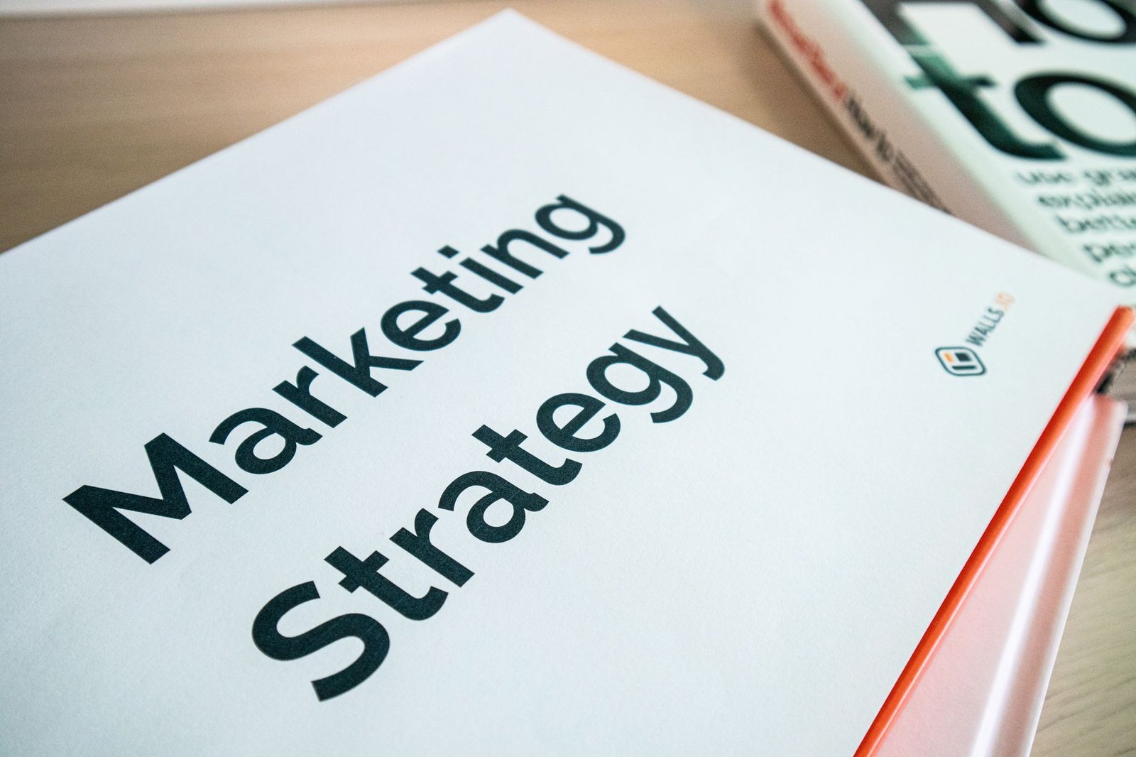 Creating a Marketing Plan Certification - Close-up of a marketing strategy document on a desk, ideal for business content.