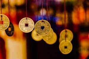 Introduction to Feng Shui Certification - A vibrant display of hanging Feng Shui coins, symbolizing wealth and prosperity.