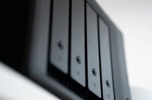 Protecting Data - Detailed view of a black data storage unit highlighting modern technology and data management.