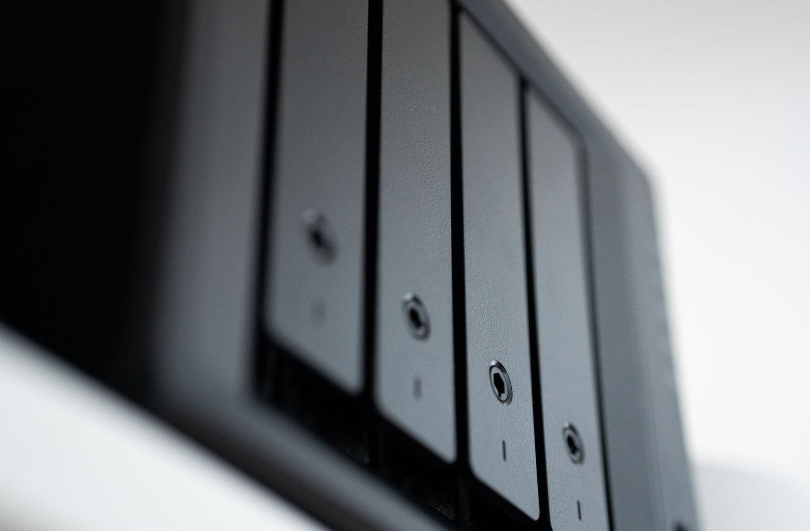 Protecting Data - Detailed view of a black data storage unit highlighting modern technology and data management.