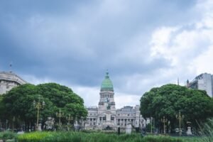 Environmental, Social and Governance Certification - View of the iconic National Congress Building in Buenos Aires with cloudy sky.