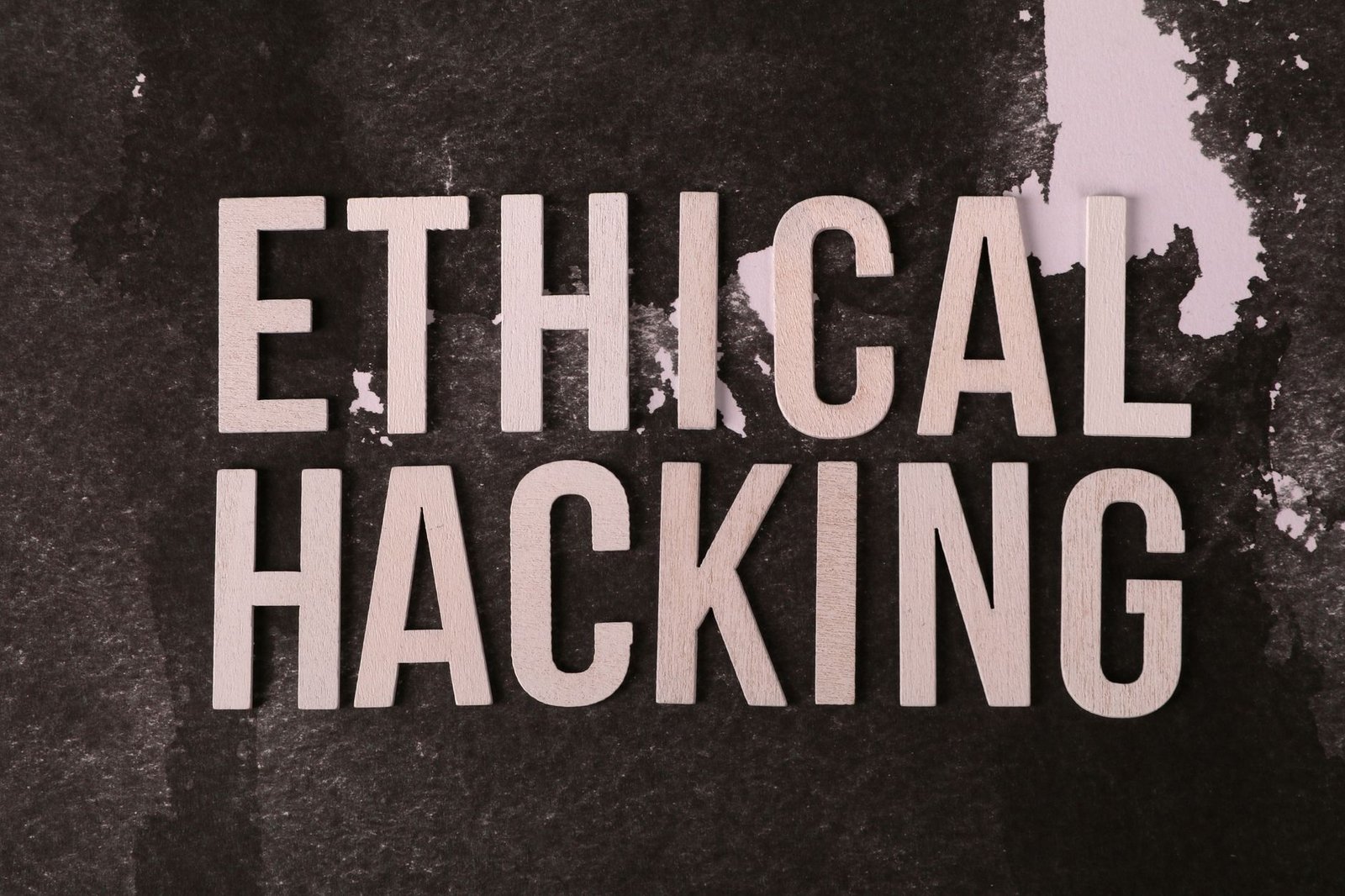Introduction to Life Hacks Certification - Creative composition with 'Ethical Hacking' text on textured background for cybersecurity theme.
