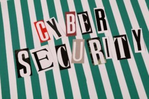 Internet Safety - Cyber security concept depicted with a creative text collage on striped background.