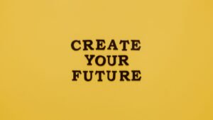Kickstart Your Career Certification - Bold text 'CREATE YOUR FUTURE' on minimalist yellow background. Inspiring design.