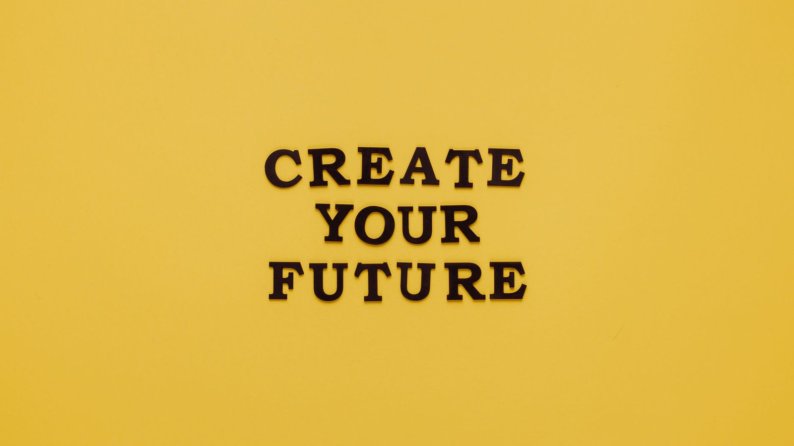Kickstart Your Career Certification - Bold text 'CREATE YOUR FUTURE' on minimalist yellow background. Inspiring design.
