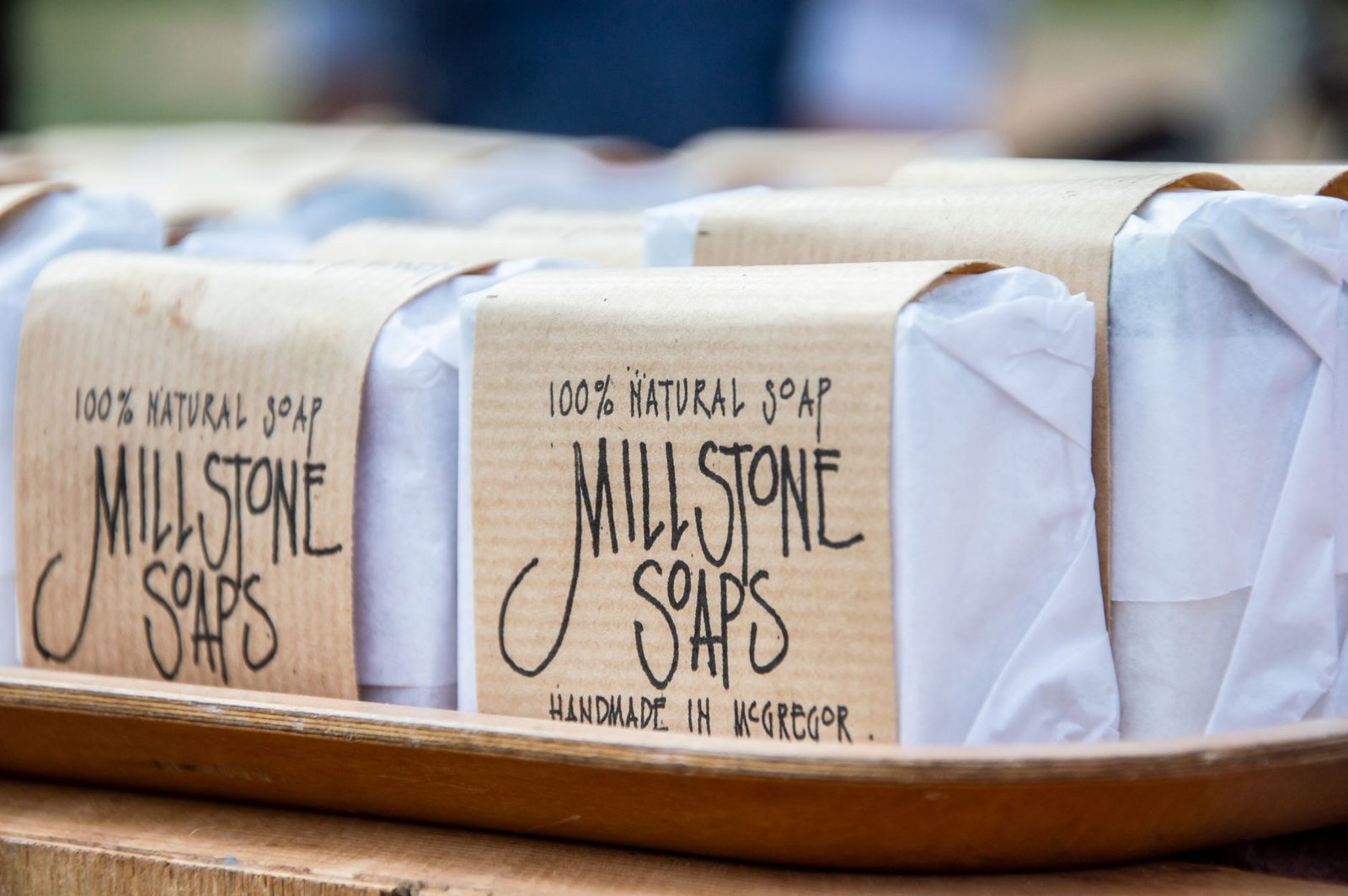 Soap Making Business Certificate - Close-up of handmade Millstone Soaps packaging showcasing natural and organic design.