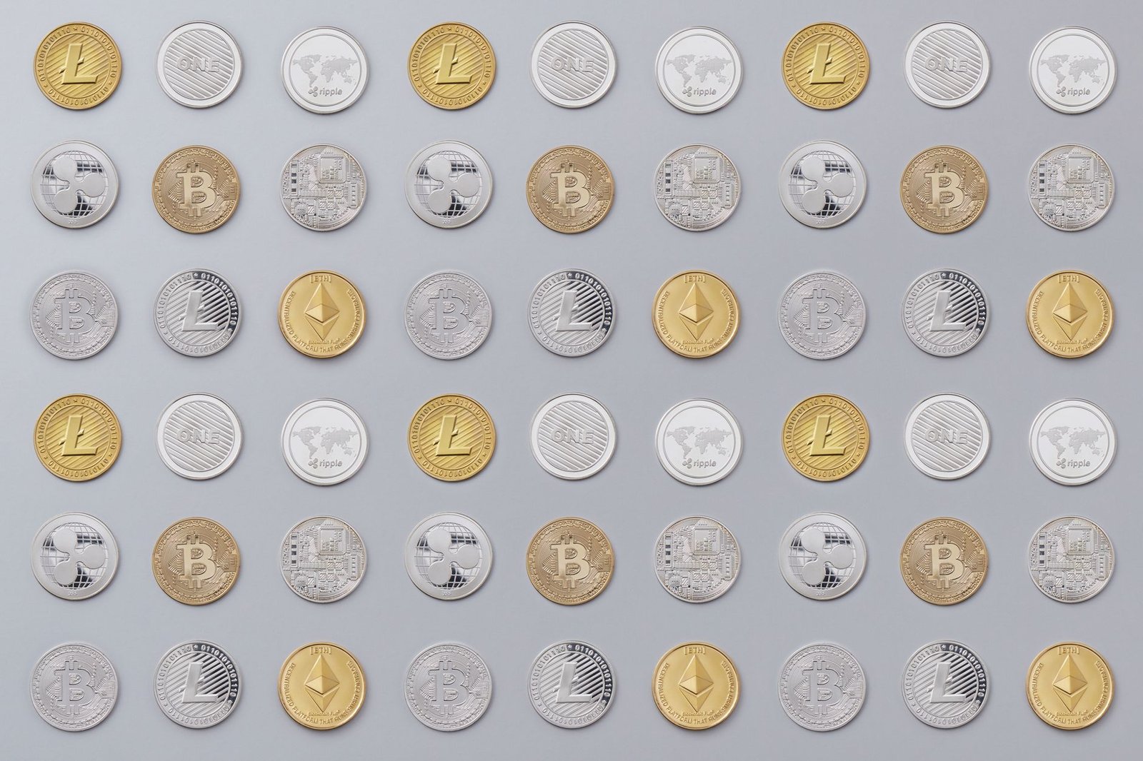Cryptocurrency - A seamless pattern of various cryptocurrency coins in gold and silver tones.
